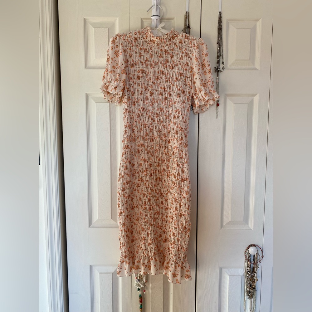 Coquette tight floral short sleeve summer dress.